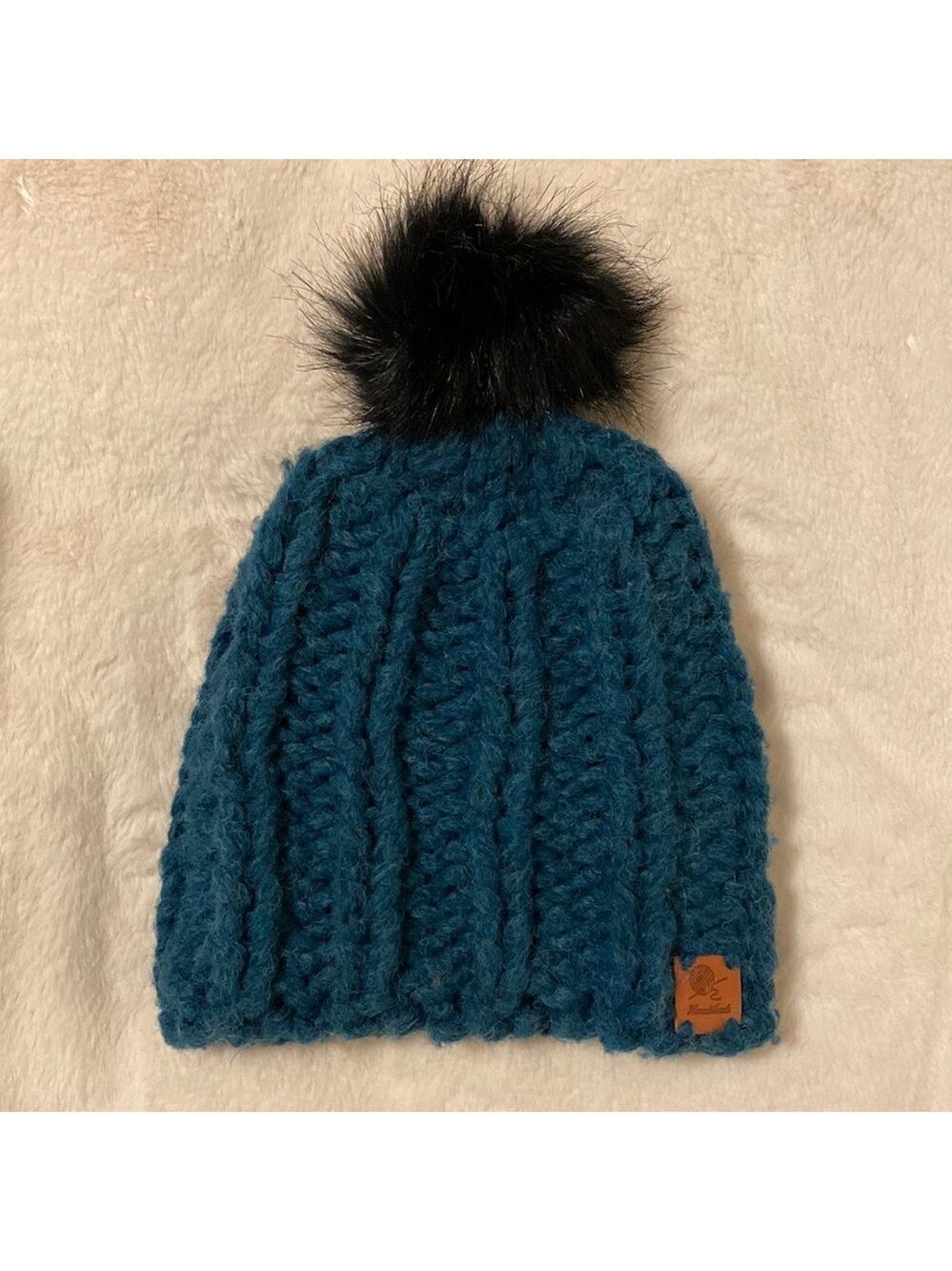 NEW Cozy hand crafted hat. Chunky teal with black fur like Pom Pom